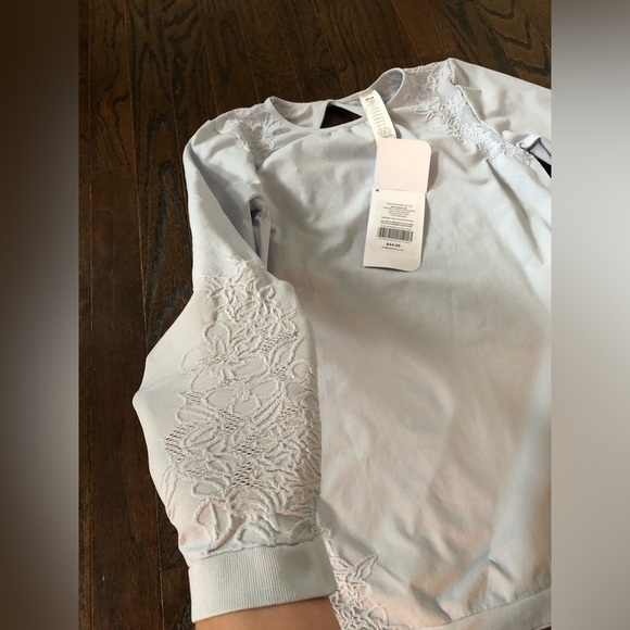 *NWT* Fabletics Women’s M Blue Elise Seamless Floral Keyhole Long-Sleeves Top - Picture 9 of 13